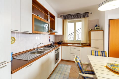 Apartment, 2 Bedrooms | Private kitchen | Full-size fridge, oven, stovetop, dishwasher