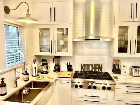 Plenty of Storage - fully stocked with 6 gas Professional Cooktop