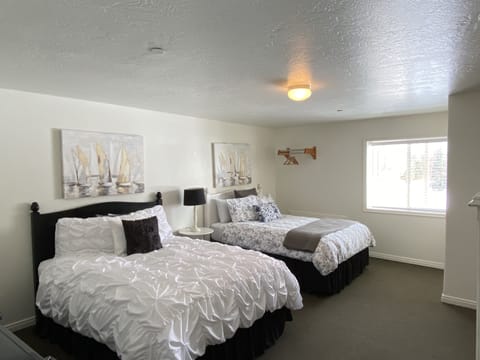 Comfort Room, 2 Queen Beds, Garden View | Memory foam beds, blackout drapes, iron/ironing board, free WiFi