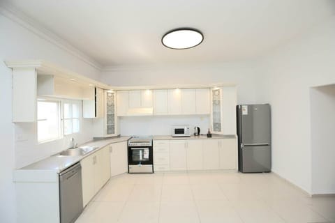 Elite Apartment | Private kitchen | Microwave, stovetop, espresso maker, electric kettle