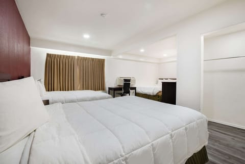 Room, Multiple Beds, Non Smoking | Premium bedding, desk, soundproofing, iron/ironing board