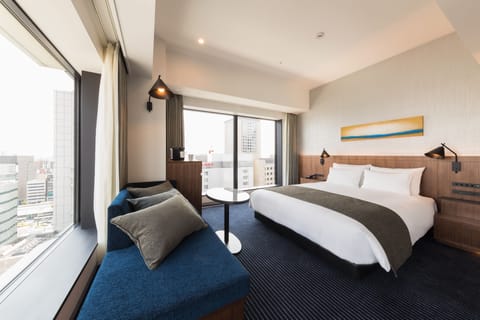 Urban Corner Queen Room, Non Smoking, City View | Minibar, in-room safe, blackout drapes, soundproofing