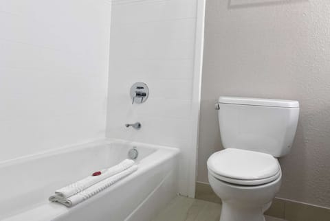Suite, 2 Queen Beds, Non Smoking | Bathroom | Combined shower/tub, free toiletries, towels