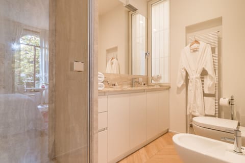 Deluxe Double Room | Bathroom | Shower, rainfall showerhead, hair dryer, bathrobes