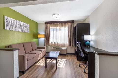 Suite, 1 King Bed, Non Smoking | Premium bedding, desk, laptop workspace, blackout drapes