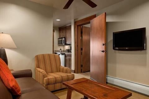 Living area in the suite (adjacent to main unit) has sofa bed & flat screen TV