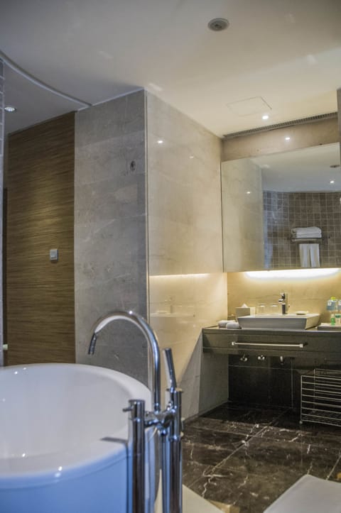 Superior Suite, 1 Bedroom | Bathroom | Separate tub and shower, deep soaking tub, rainfall showerhead