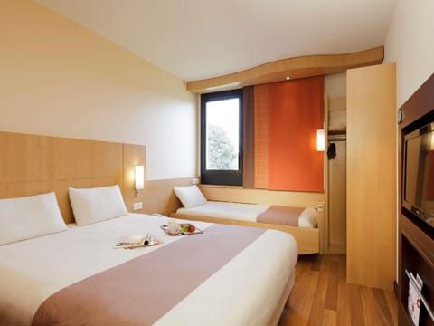 Desk, blackout drapes, soundproofing, free cribs/infant beds