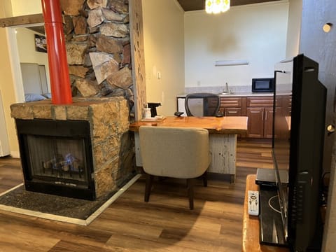 Honeymoon Suite, Private Bathroom | Living area | 48-inch TV with digital channels, streaming services