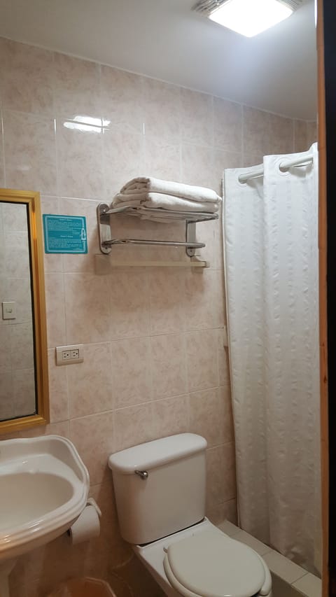 Basic Double Room | Bathroom | Shower, towels, soap, shampoo