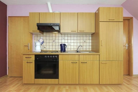 Family Apartment, 2 Bedrooms (Spiekeroog) | Private kitchen | Fridge, stovetop, coffee/tea maker, electric kettle