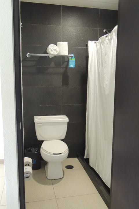 Standard Room, 2 Double Beds | Bathroom | Shower, free toiletries, towels, soap