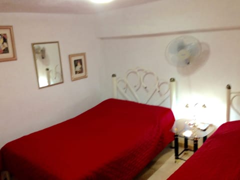 Triple Room | Minibar, individually decorated, blackout drapes, bed sheets