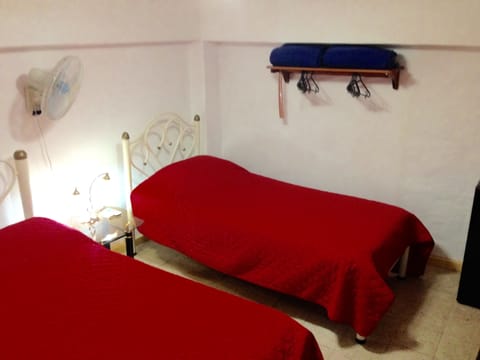 Triple Room | Minibar, individually decorated, blackout drapes, bed sheets
