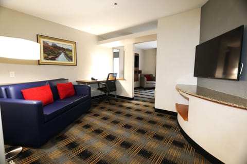 Suite, 1 King Bed, Non Smoking | Pillowtop beds, in-room safe, desk, laptop workspace