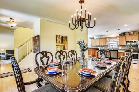 Dining table seats up to 12 with extra chairs.