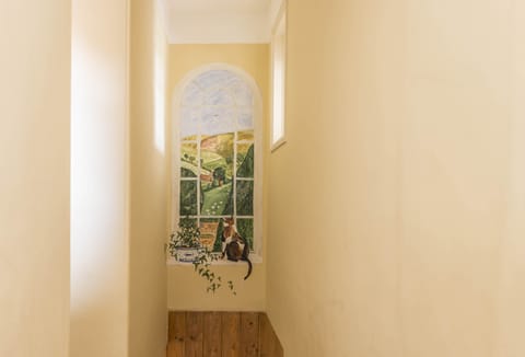 First floor: Beautiful painted mural of the gardens at Hearn Lodge
