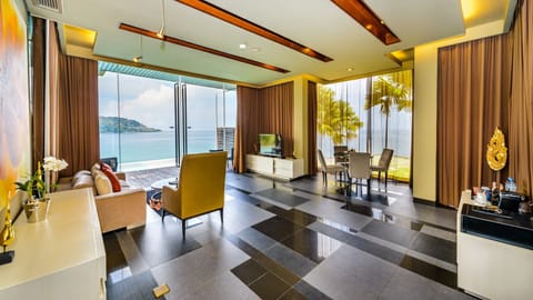 Impiana Private Villa | Living area | 42-inch LCD TV with cable channels, TV, DVD player