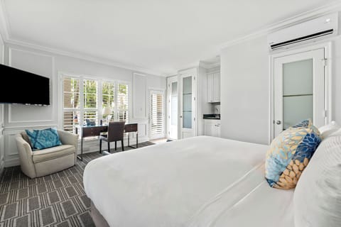 King Deluxe Poolside Room | Frette Italian sheets, premium bedding, down comforters, pillowtop beds