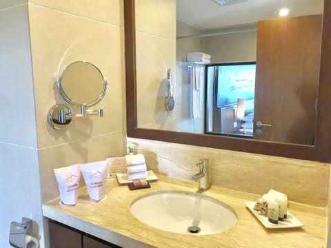 Luxury Suite, Balcony, Mountain View | Bathroom | Bathtub, deep soaking tub, hair dryer, bathrobes