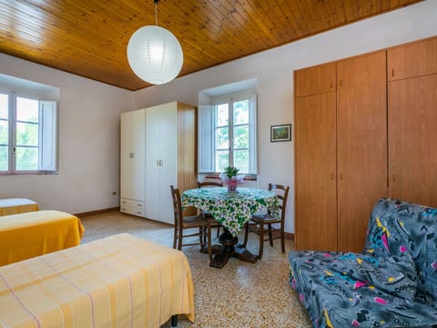 Furniture, Table, Property, Window, Houseplant, Comfort, Wood, Interior Design, Textile, Decoration