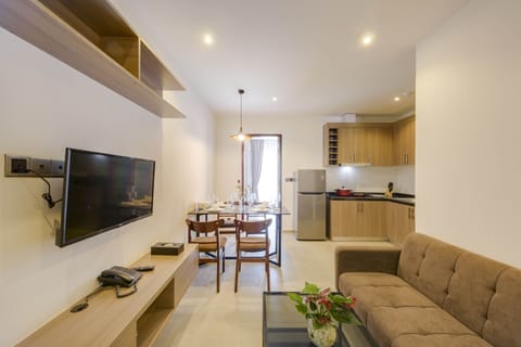 One-Bedroom Suite | Living room | 47-inch flat-screen TV with cable channels, TV