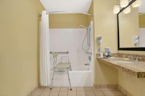 Combined shower/tub, deep soaking tub, free toiletries, hair dryer