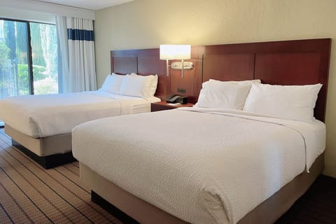 Deluxe Room, 2 Queen Beds, Patio | Premium bedding, pillowtop beds, in-room safe, individually decorated