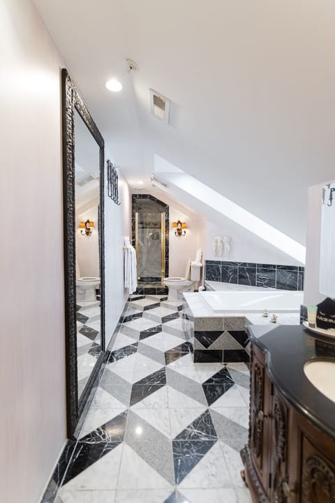 303 Estate Room | Bathroom | Combined shower/tub, deep soaking tub, hair dryer, bathrobes