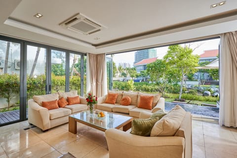 3 Bedroom Standard Villa, Garden View | Living area | 40-inch flat-screen TV with digital channels