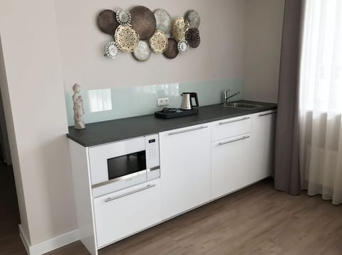 Classic Double Room | Private kitchenette | Full-size fridge, microwave, coffee/tea maker, electric kettle