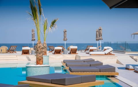 Outdoor pool, free cabanas, pool umbrellas