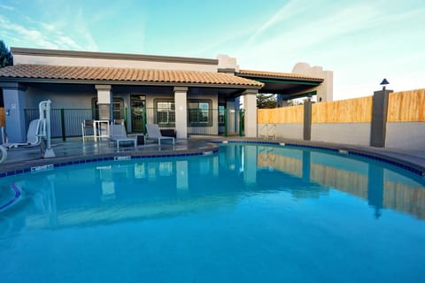 Seasonal outdoor pool, open 10:00 AM to 11:00 PM, sun loungers