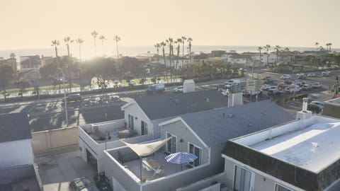 Beach Happy is the unit with the sun sail and fully furnished back deck!