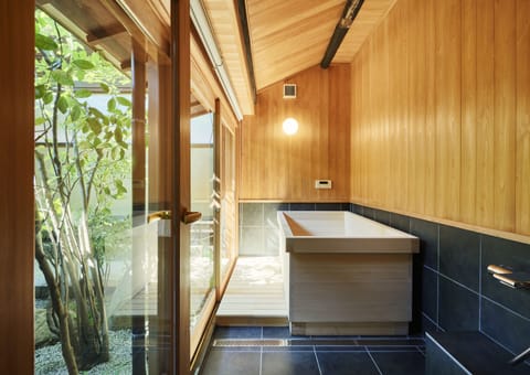 Japanese Western Style Room with Private Partially Open-air Bath, Courtyard, 1st Floor, Non Smoking | Bathroom | Free toiletries, hair dryer, electronic bidet, towels