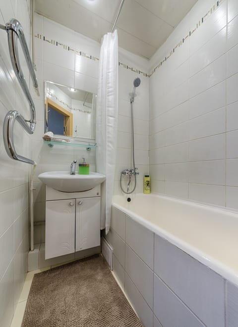 Apartment, 2 Bedrooms | Bathroom | Bathtub, hair dryer, slippers, towels