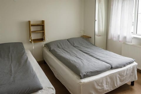 Triple Room, Shared Bathroom | Free cribs/infant beds, free WiFi, bed sheets