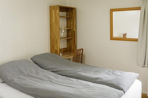 Twin Room, Shared Bathroom | Free cribs/infant beds, free WiFi, bed sheets