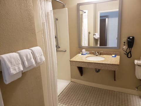 Room, 1 Queen Bed, Accessible, Non Smoking (Communications, Roll-In Shower) | Bathroom | Combined shower/tub, free toiletries, hair dryer, towels