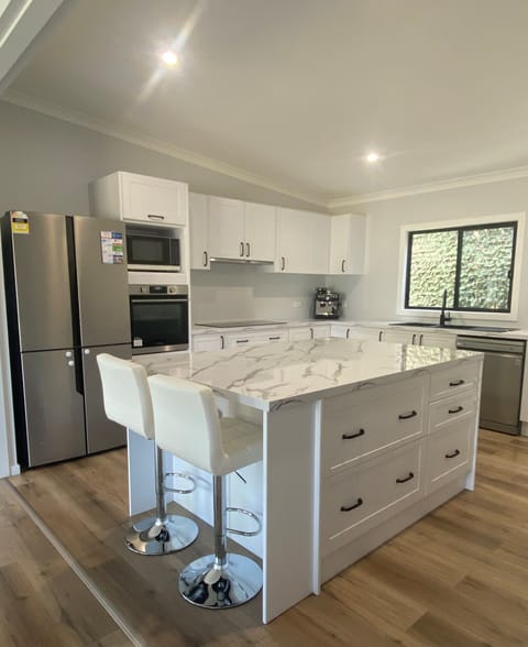 Holiday Home | Private kitchen | Full-size fridge, microwave, toaster, cookware/dishes/utensils