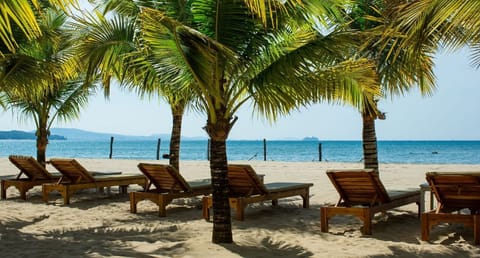 Private beach, white sand, sun loungers, beach umbrellas