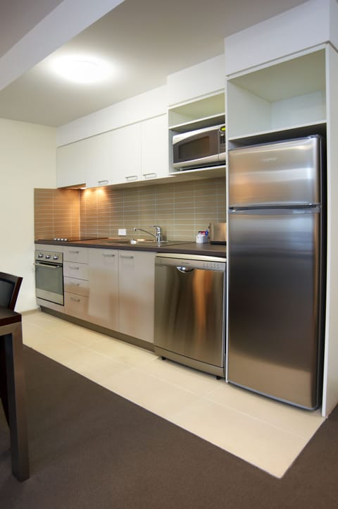 One Bedroom Apartment | Private kitchen | Fridge, microwave, stovetop, dishwasher