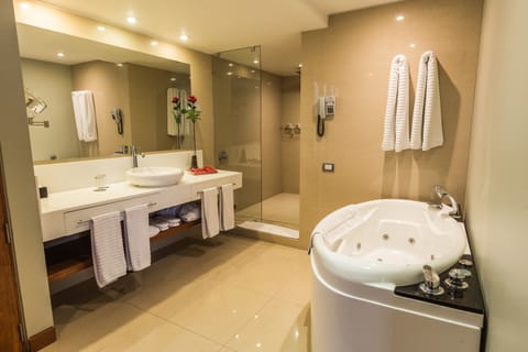 Terrace Suite King Room | Bathroom | Separate tub and shower, deep soaking tub, rainfall showerhead