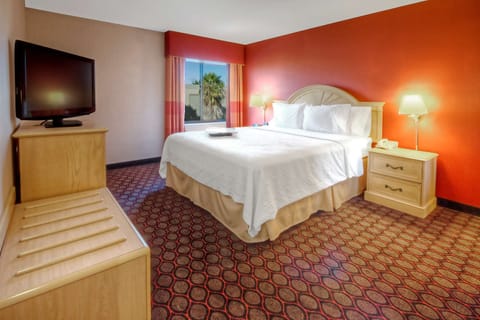 Suite, 1 King Bed, Non Smoking | In-room safe, iron/ironing board, free cribs/infant beds