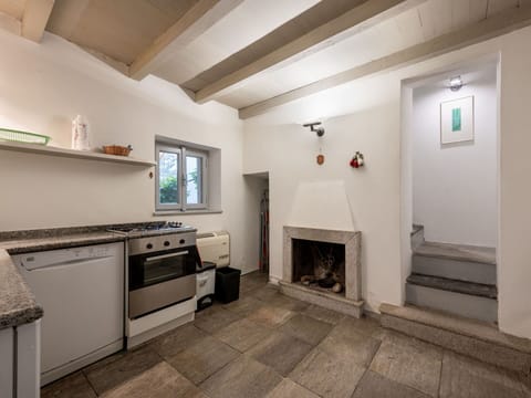 Property, Picture Frame, Cabinetry, Wood, Interior Design, Gas Stove, Floor, Flooring, Kitchen Appliance