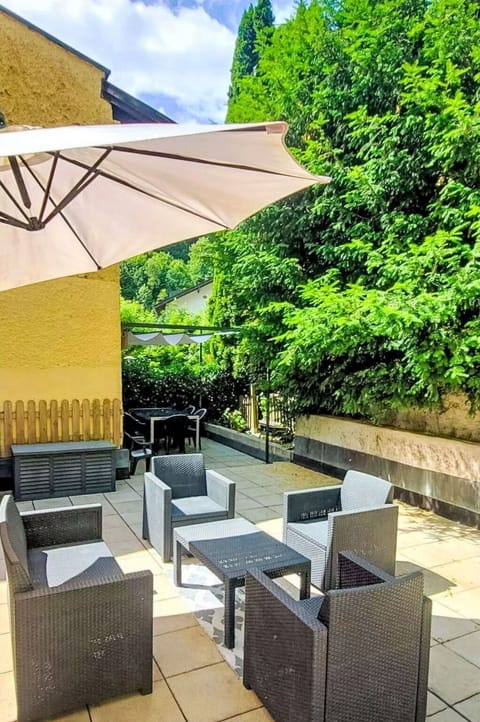 Furniture, Cloud, Plant, Sky, Shade, Umbrella, Outdoor Furniture, Tree, Urban Design, Real Estate