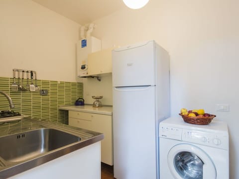 Property, Laundry Room, Room, Major Appliance, Kitchen, Real Estate, Clothes Dryer, Cabinetry, House, Furniture