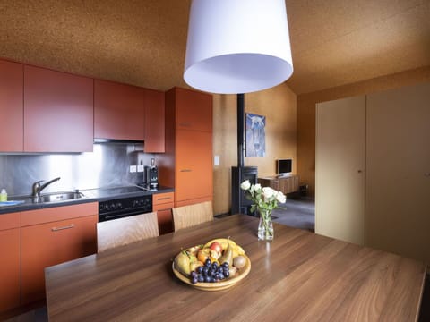 Cabinetry, Property, Table, Furniture, Countertop, Building, Wood, Interior Design, Lighting, Kitchen Appliance