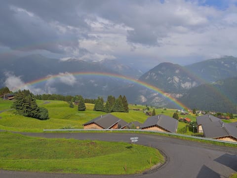 Sky, Highland, Mountainous Landforms, Cloud, Natural Landscape, Mountain Range, Meteorological Phenomenon, Mountain, Hill