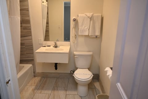 Double Room, 2 Double Beds, Non Smoking | Bathroom | Combined shower/tub, free toiletries, hair dryer, towels